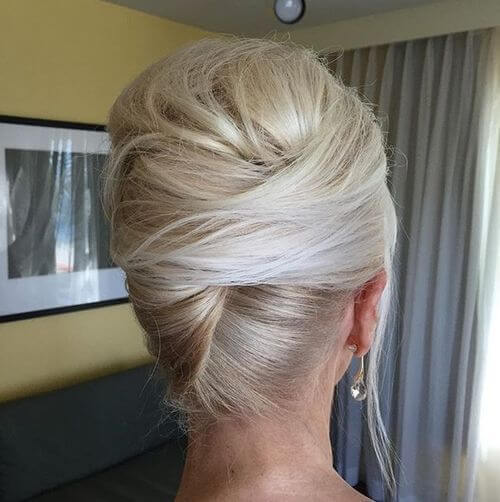 This twisted updo has some serious height.