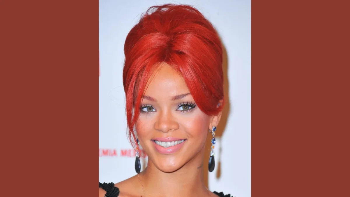 Rihanna with bright scarlet red hair